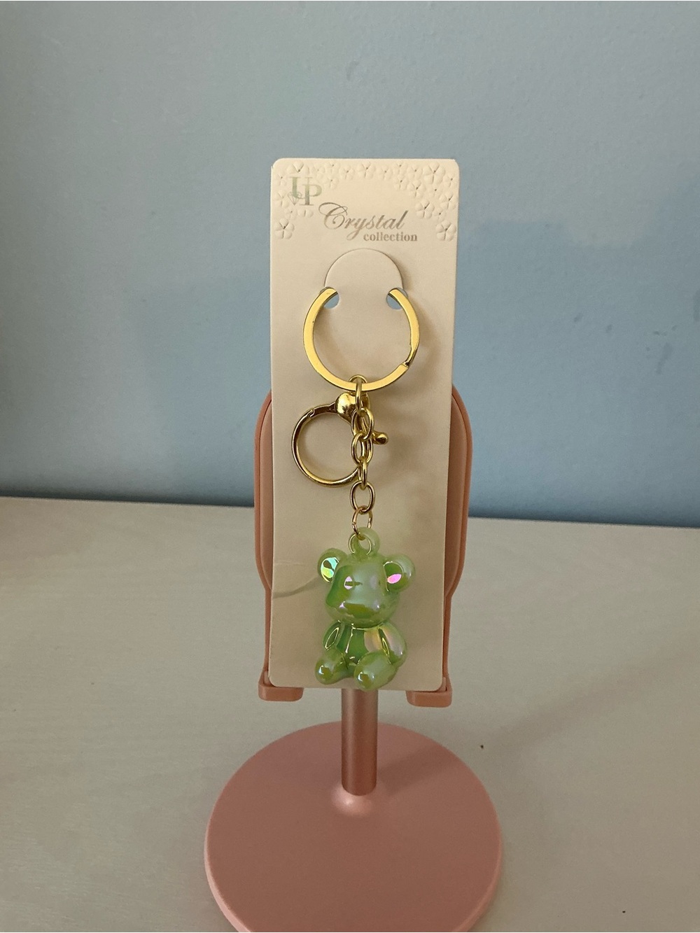 Gold-Tone Keychain with Green Iridescent Bear Charm